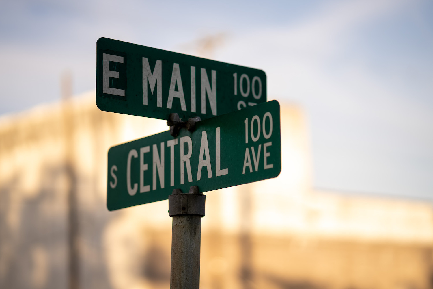 Sunset view of E Main and S Central street sign